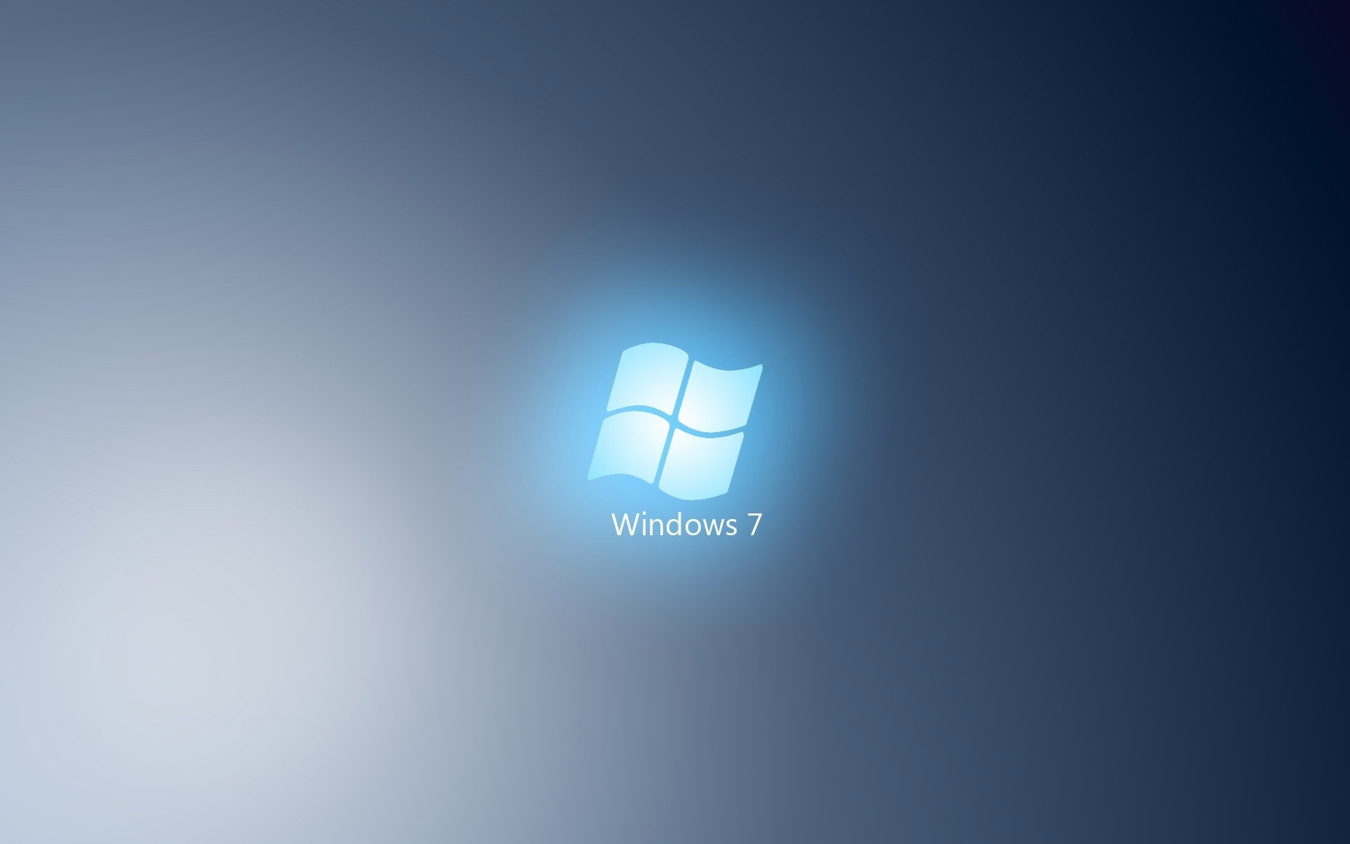 Логотип Виндоус семь на голубом сияющем фоне