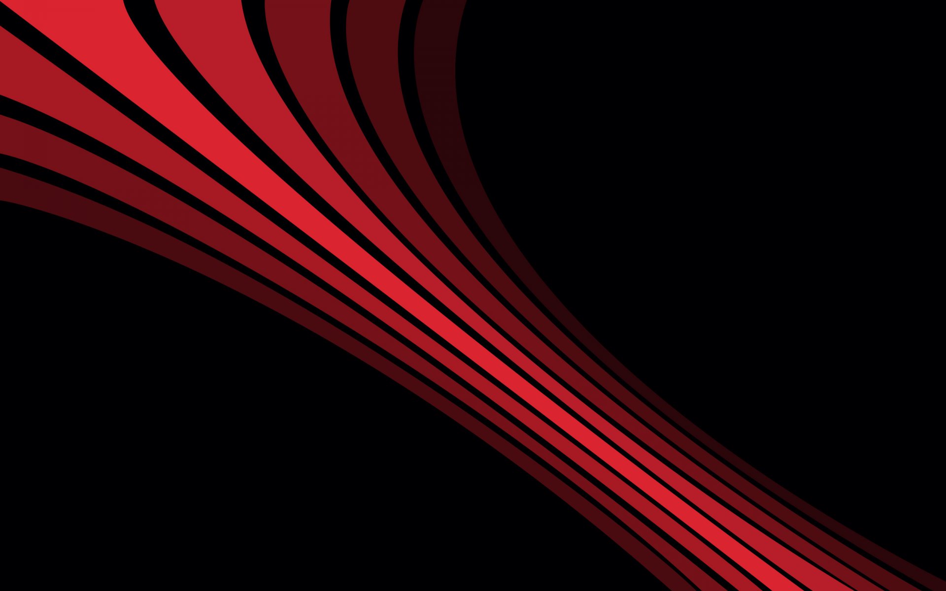 Красные закручивающиеся световые полосы на чёрном фоне