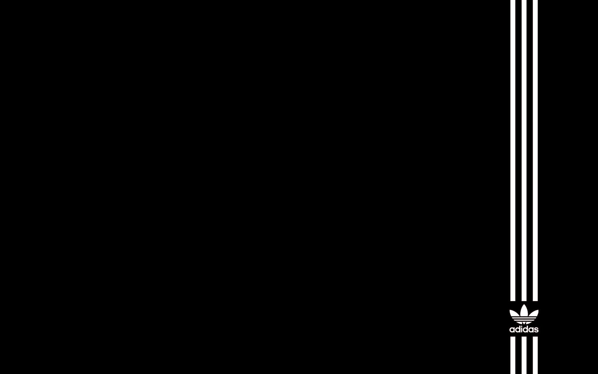 Эмблема адида на чёрном фоне