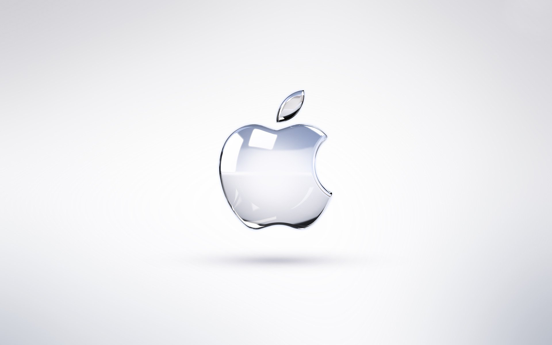Стеклянная эмблема Apple на белом фоне