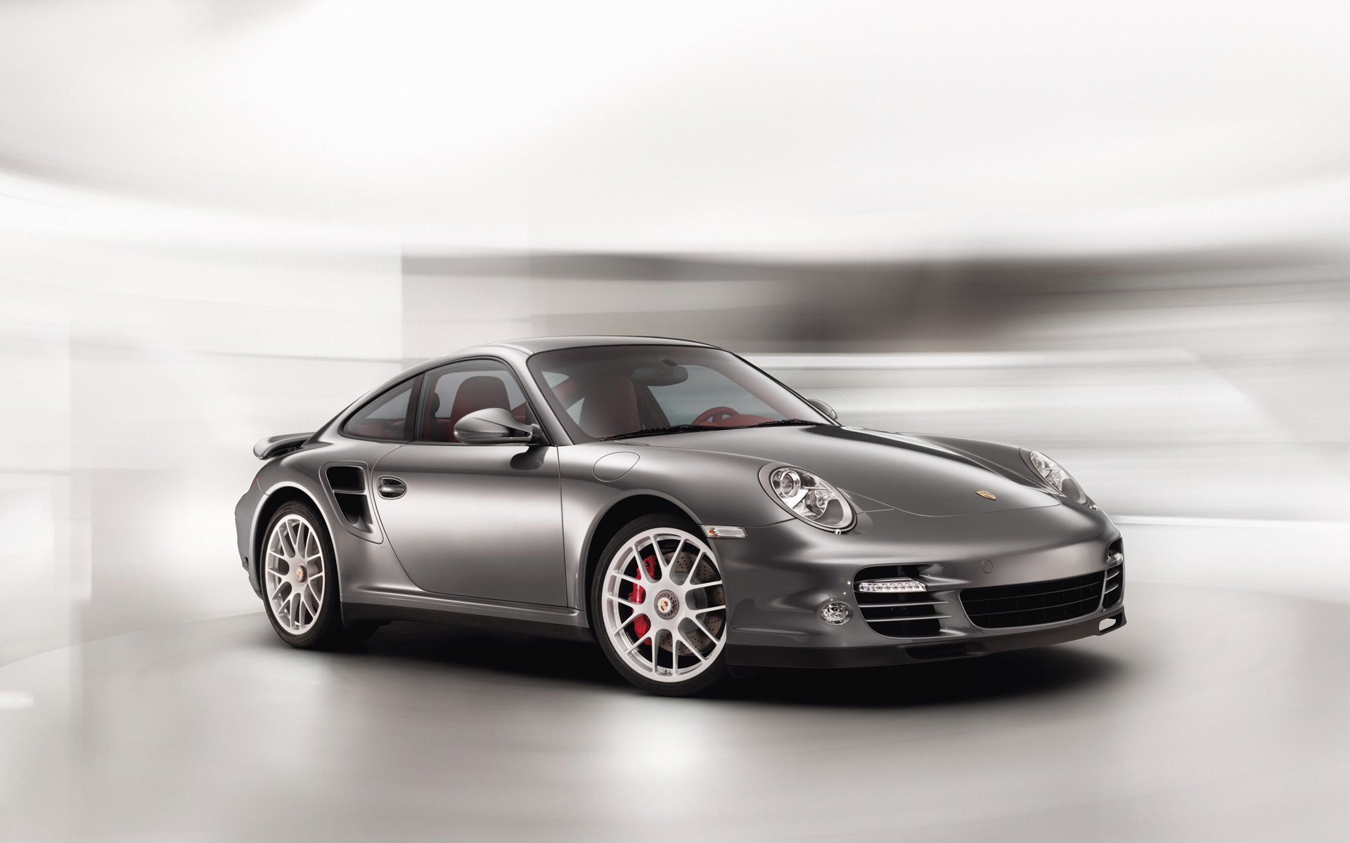 серый автомобиль Porsche 911 бесплатно