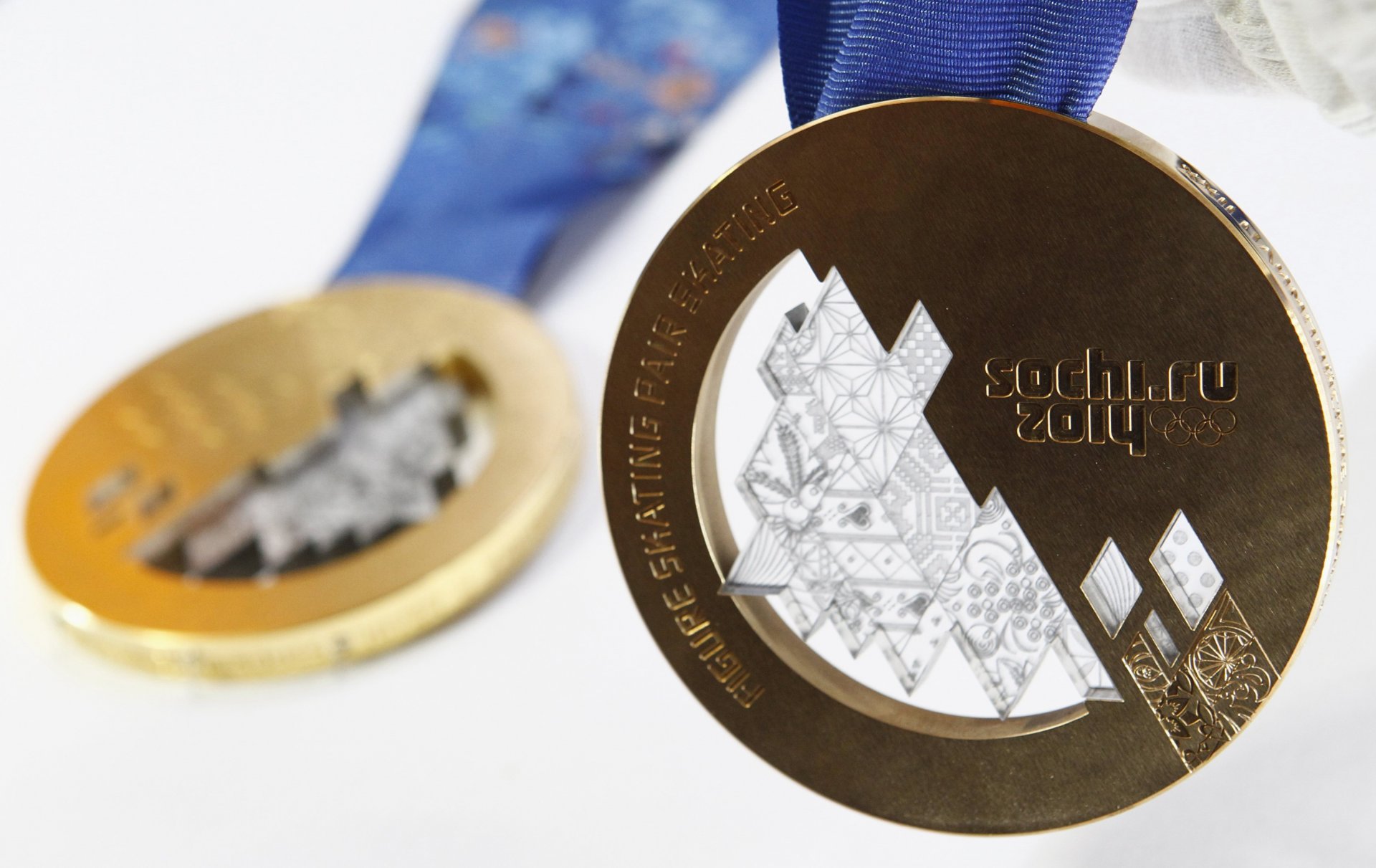 макро медаль золотая медаль олимпийские игры сочи-2014 золото бронза бронзовая медаль