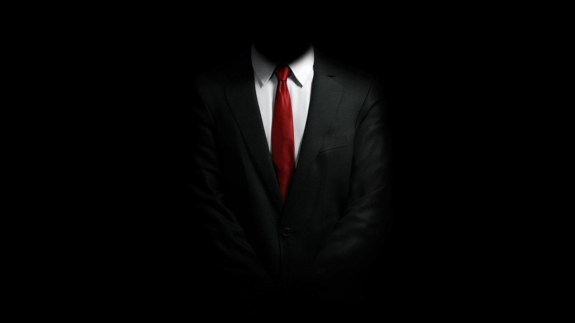 Мужчина в черном костюме без лица