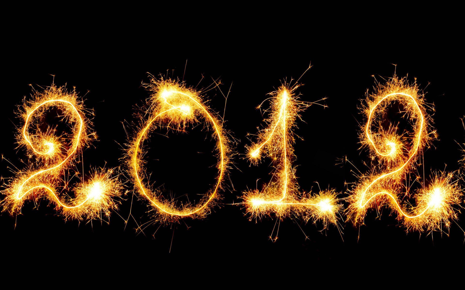 Цифры 2012 года. Новый год 2012. Бенгальские огни. Бенгальские огни надпись. Огненные цифры.